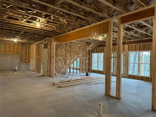 a view of a room with wooden walls