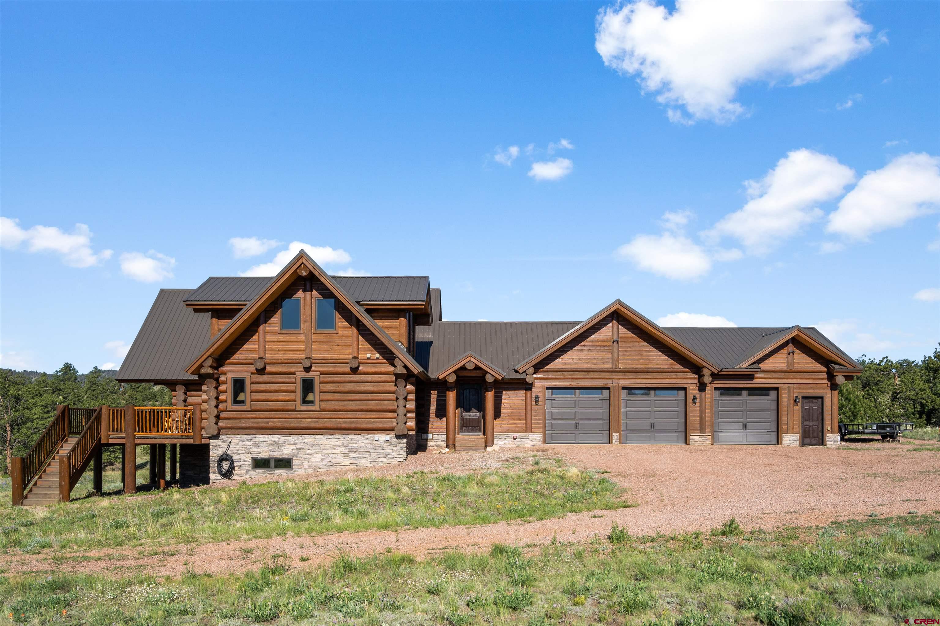 Inspirit Ranch Guffey, CO 80820 - Photo 25 of 35 a front view of a house with a yard