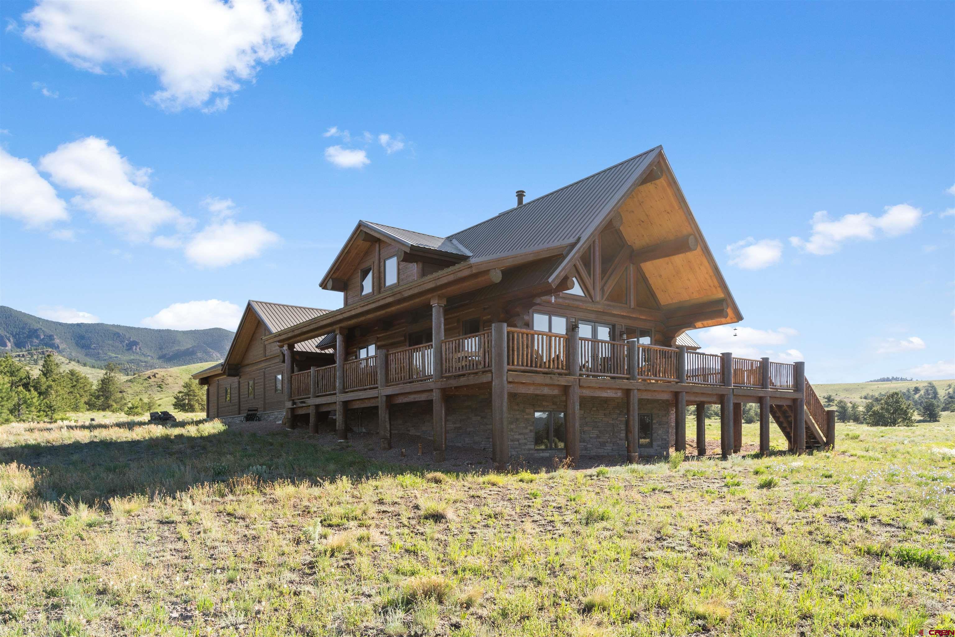 Inspirit Ranch Guffey, CO 80820 - Photo 4 of 35 a front view of a house with a yard