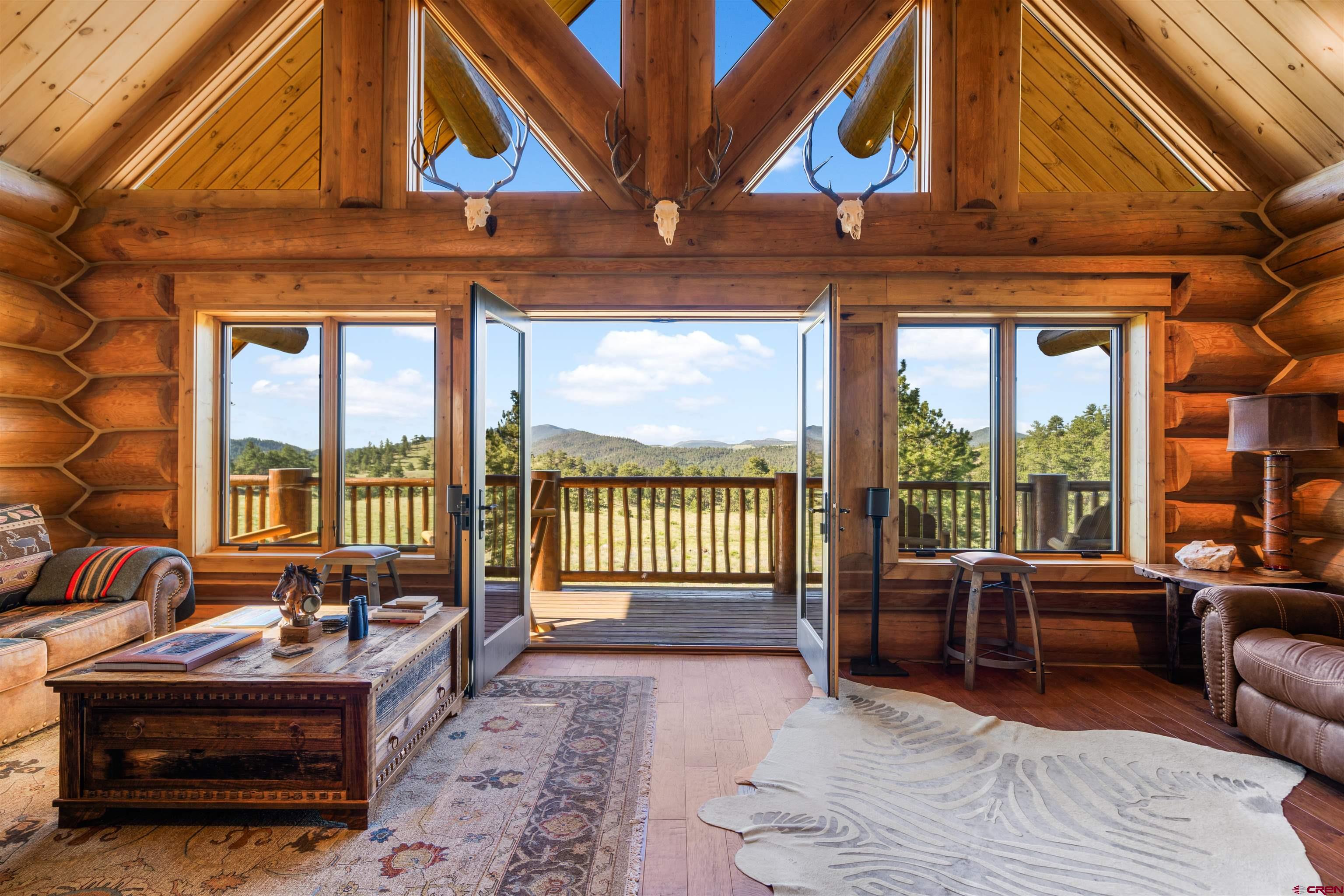 Inspirit Ranch Guffey, CO 80820 - Photo 5 of 35 a living room with furniture a fireplace