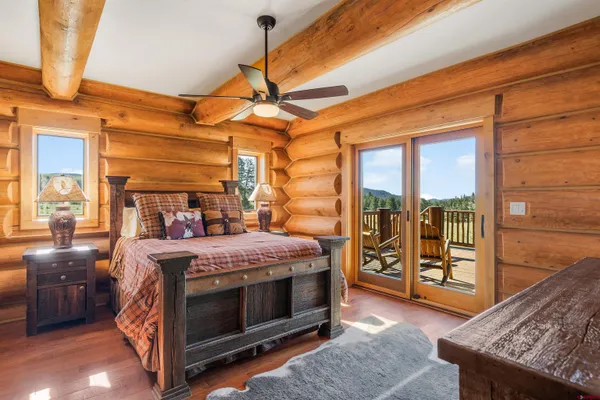 a bed room with a bed and a window