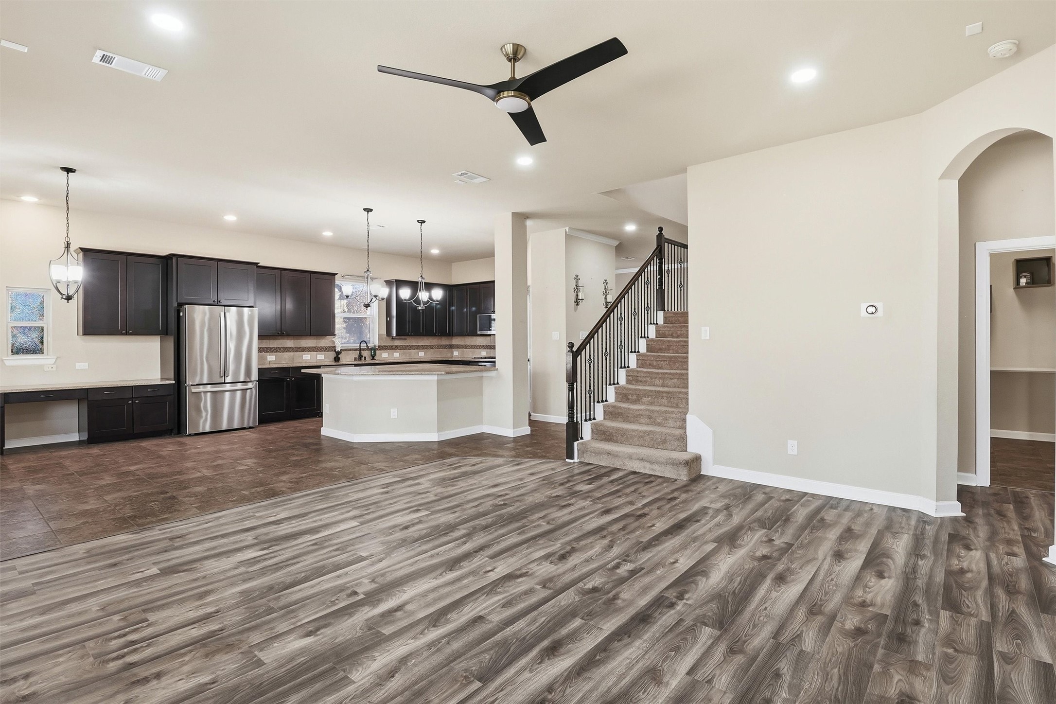 26202 Rustic Ranch Lane Katy, TX 77494 - Photo 9 of 50 Living area is open to the kitchen and breakfast area.