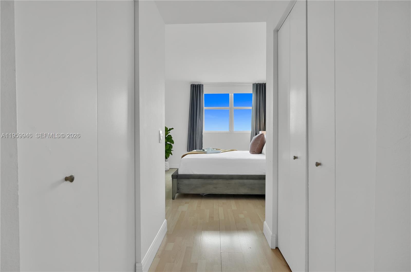 2475 Brickell Avenue, Unit 1509 Miami, FL 33129 - Photo 15 of 32 Hallway to Bedroom with Custom Closets