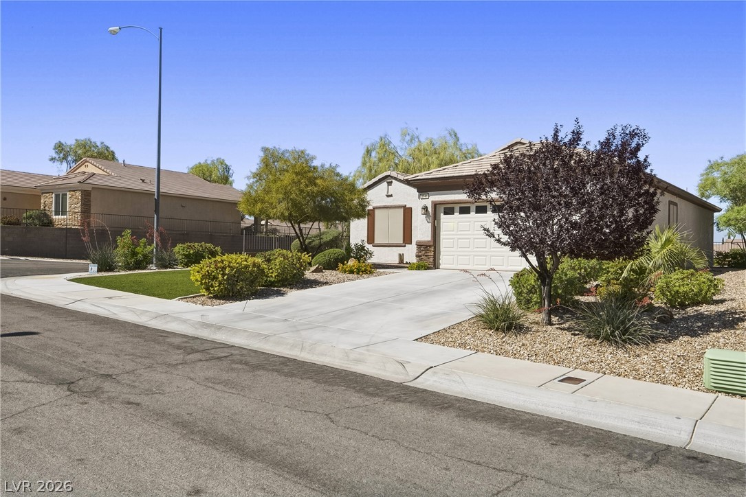 2541 Darda Street Henderson, NV 89044 - Photo 25 of 26 This charming home offers a well-maintained exterior and a welcoming curb appeal.