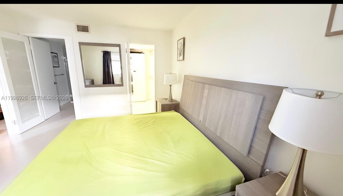 6801 Harding Avenue, Unit 301 Miami Beach, FL 33141 - Photo 8 of 10 a swimming pool with window