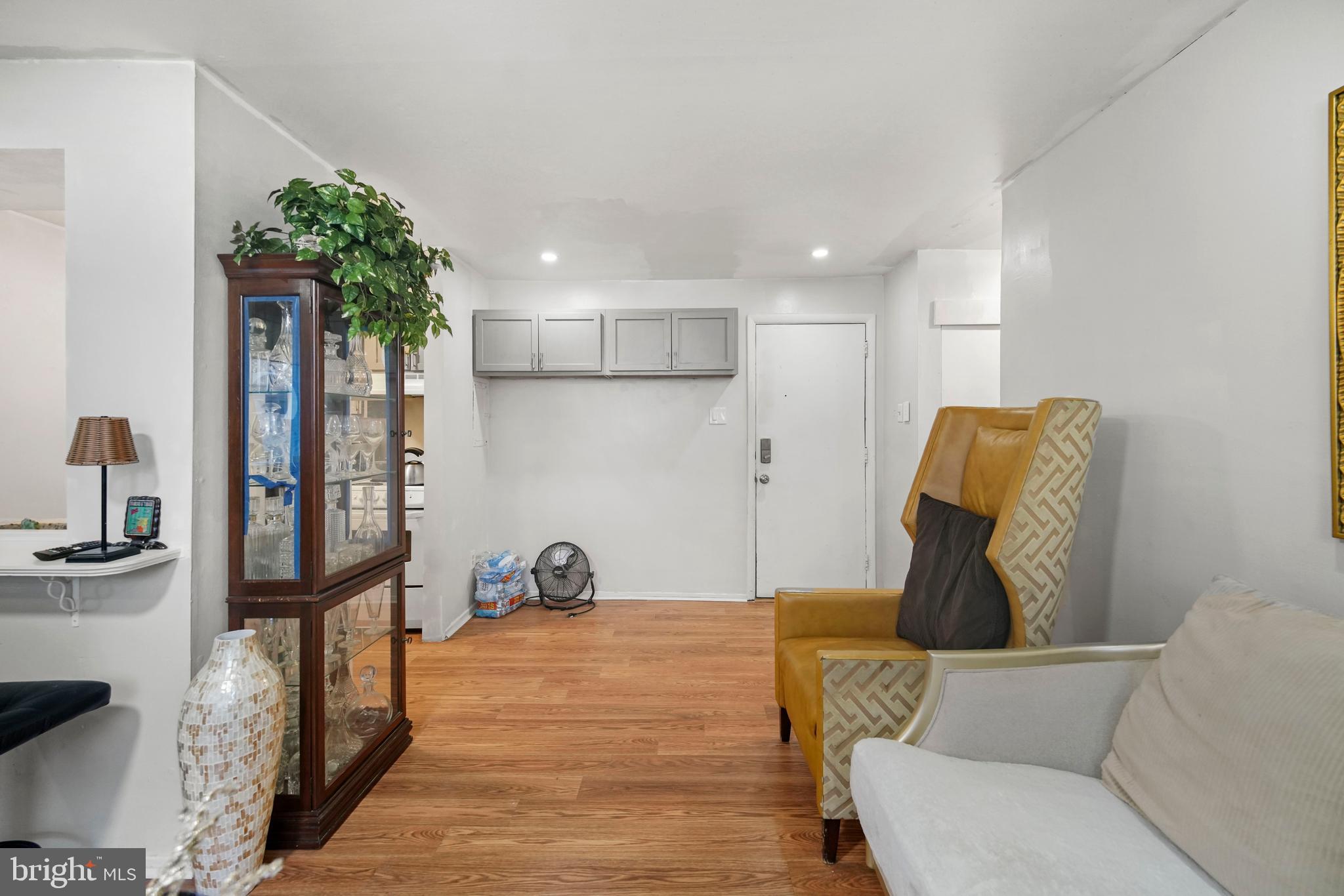8115 West Chester Pike, Unit A8 Upper Darby, PA 19082 - Photo 14 of 17 a living room with furniture flowerpot and a potted plant