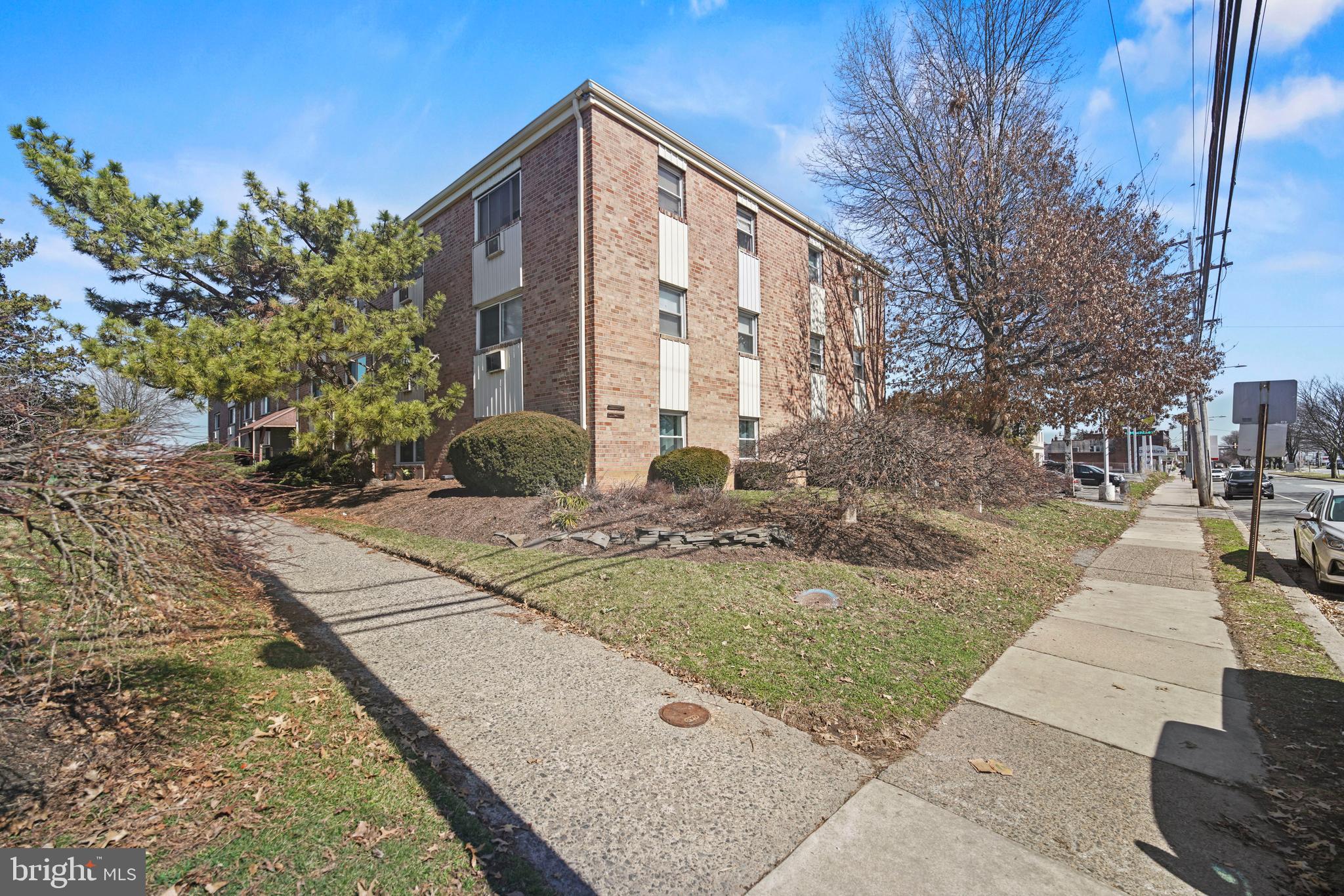 8115 West Chester Pike, Unit A8 Upper Darby, PA 19082 - Photo 6 of 17 a view of a building with pathway