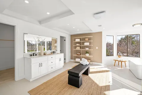 a living room with granite countertop furniture and fireplace