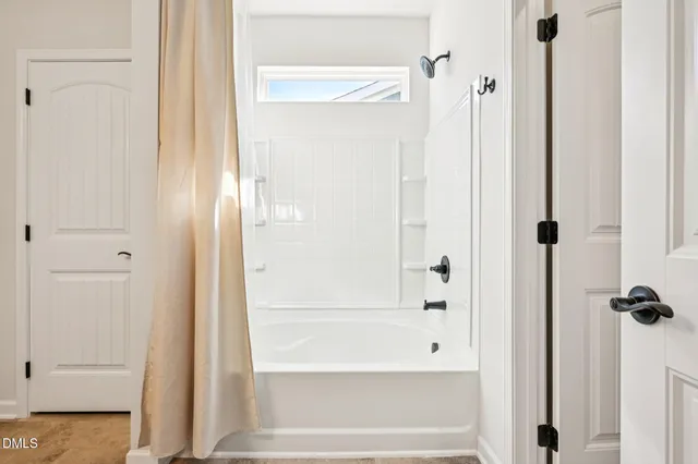 a bathroom with a sink vanity and a mirror
