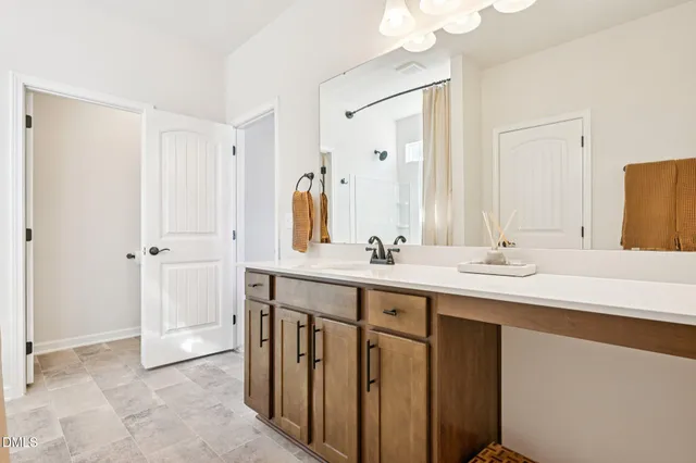 a view of storage and utility room with racks on the wall