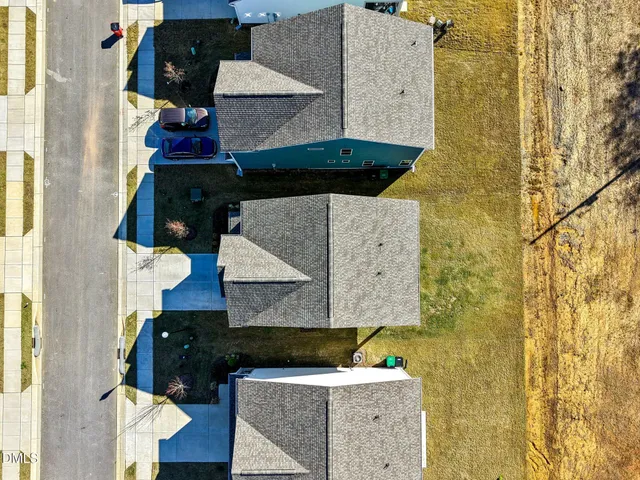 an aerial view of a building with outdoor space