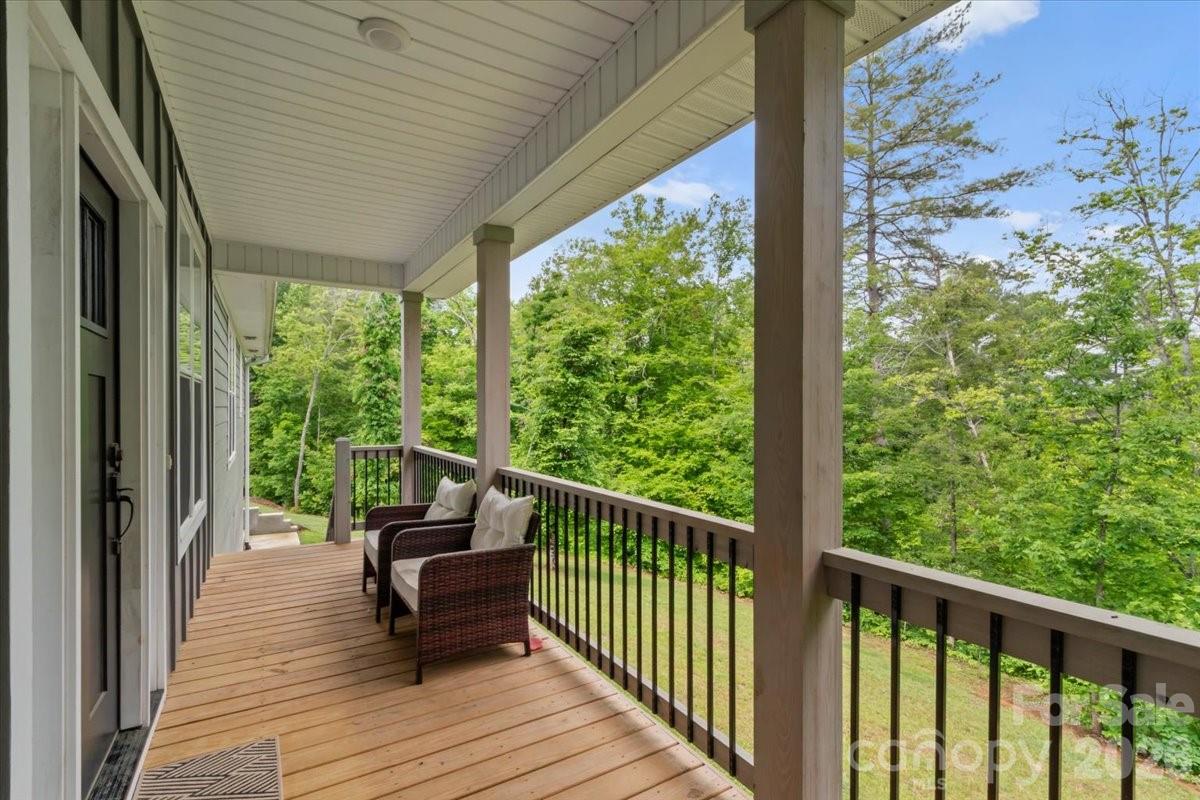 36 Cherry Ridge Lane Weaverville, NC 28787 - Photo 3 of 37 a view of a balcony with wooden floor