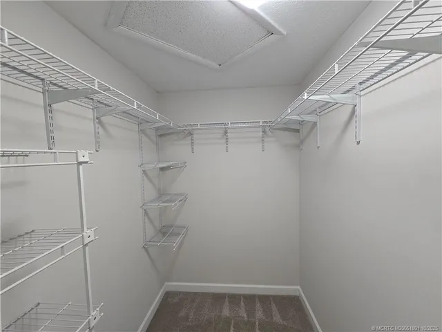 a view of a room with racks on the wall