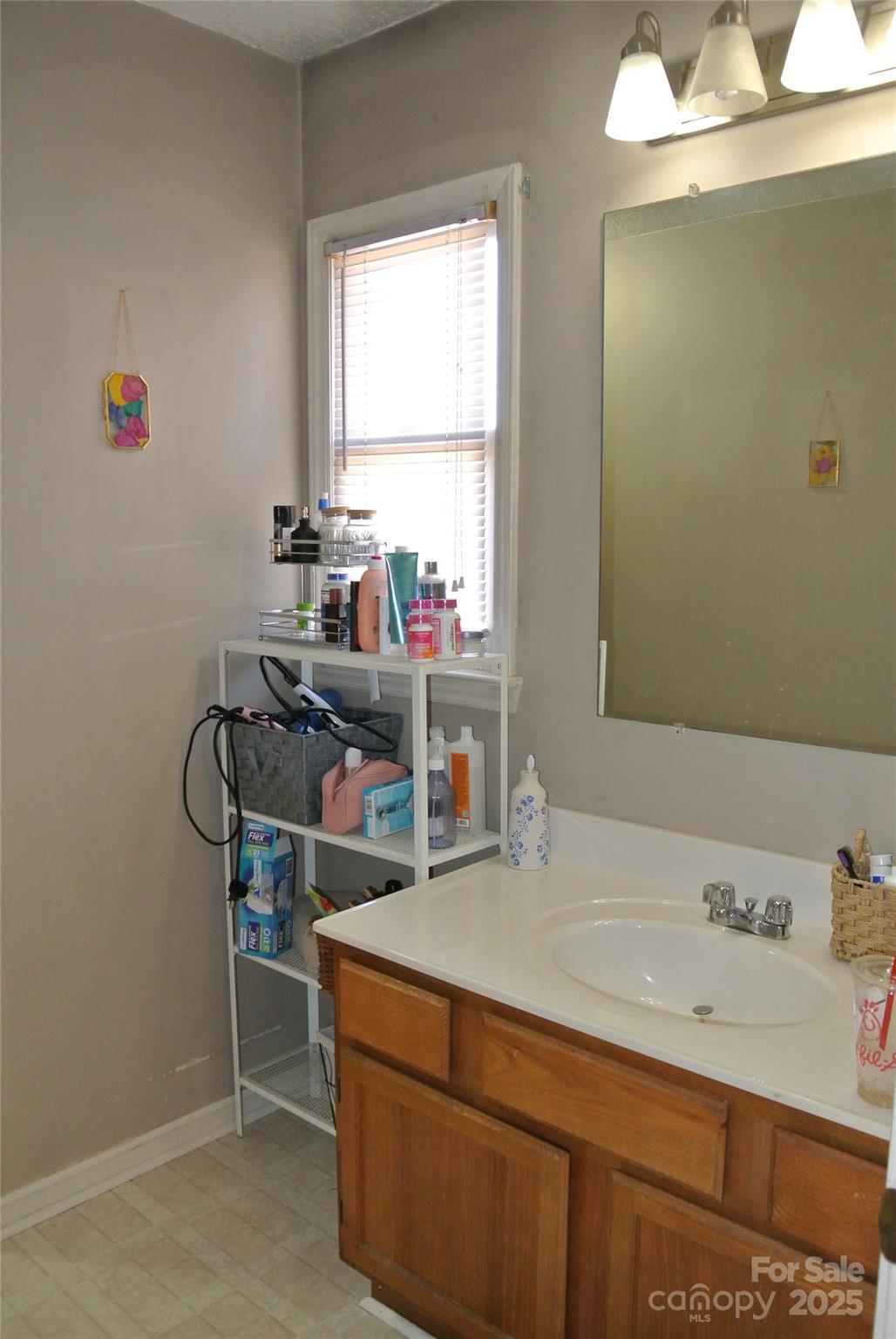 225 McDade Road Forest City, NC 28043 - Photo 39 of 44 a room with a desk and a window