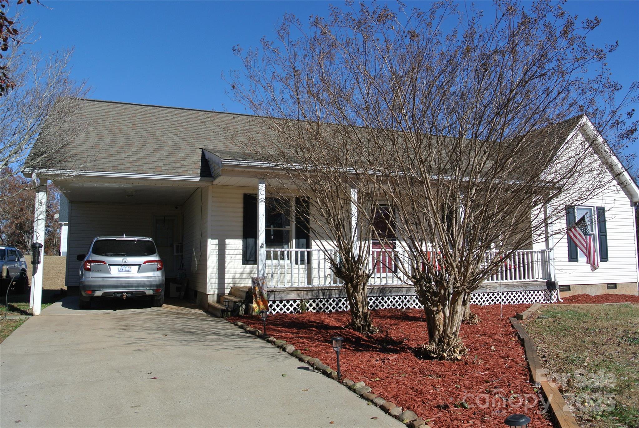 225 McDade Road Forest City, NC 28043 - Photo 8 of 44 a front view of a house with a outdoor space