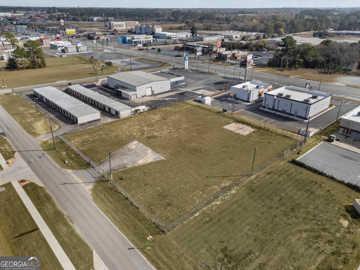 0 Hunt Road Tifton, GA 31794 - Photo 12 of 26 a view of a lake with lawn chairs