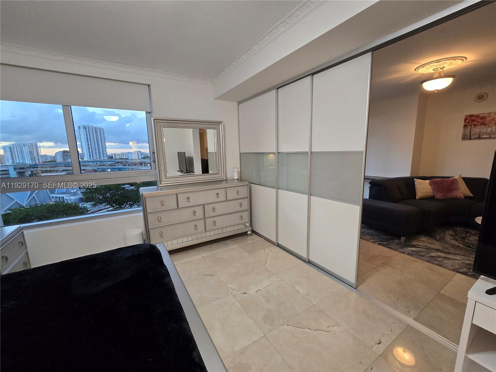 90 Southwest 3rd Street, Unit 1110 Miami, FL 33130 - Photo 18 of 55 Bedroom can be made completely independent by closing modern frosted sliding doors (shown partially opened on this picture), fully closed and independet/private, or completely opened for full open layout.