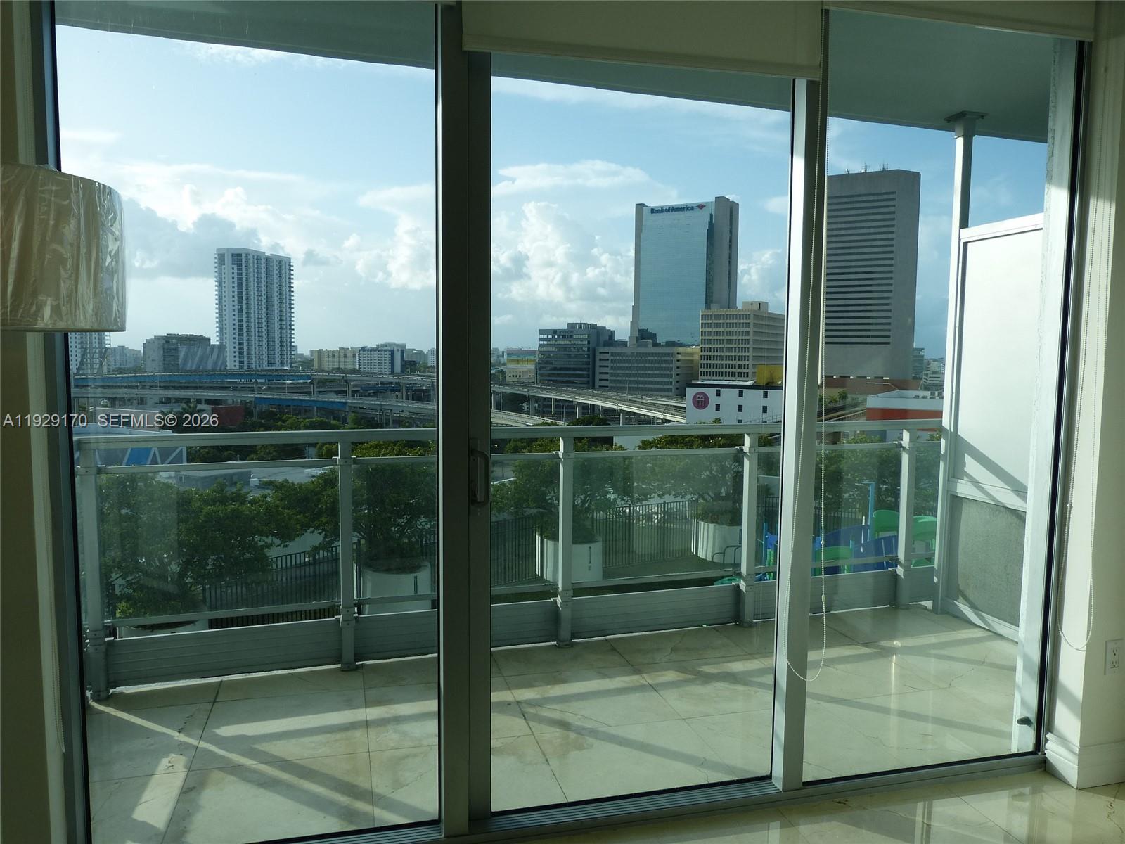 90 Southwest 3rd Street, Unit 1110 Miami, FL 33130 - Photo 21 of 55 a bathroom with a glass shower door