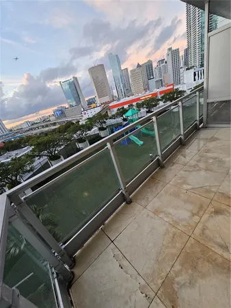 a view of a city with tall buildings