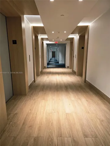 a swimming pool with outdoor seating and yard