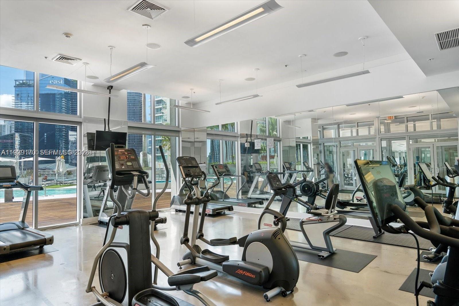 90 Southwest 3rd Street, Unit 1110 Miami, FL 33130 - Photo 34 of 55 a view of a room with gym equipment