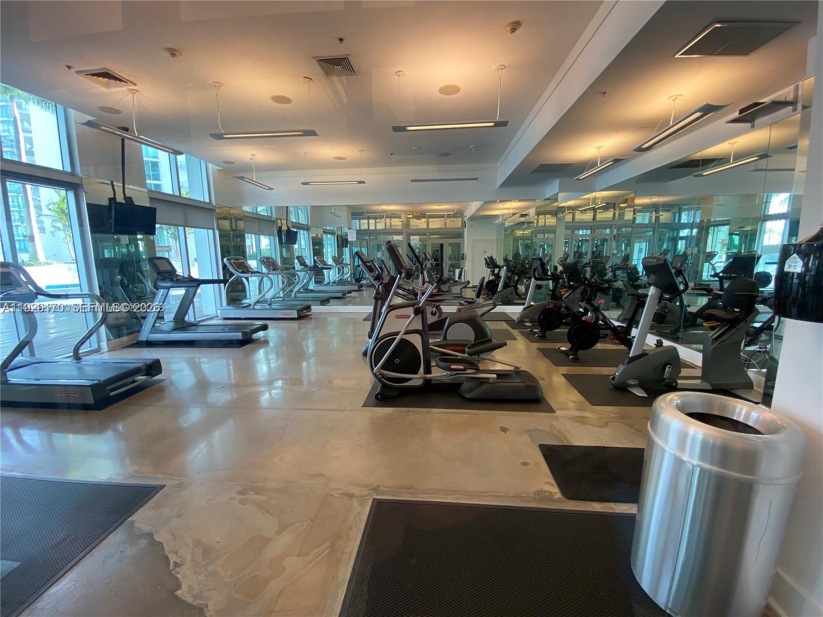 90 Southwest 3rd Street, Unit 1110 Miami, FL 33130 - Photo 36 of 55 a view of a room with gym equipment