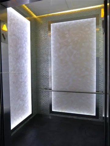 a view of a back yard from a room