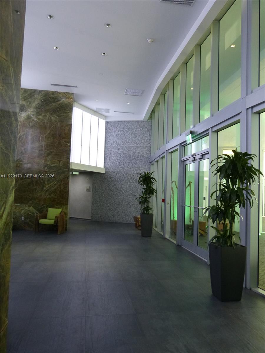 90 Southwest 3rd Street, Unit 1110 Miami, FL 33130 - Photo 44 of 55 a view of an entryway with a garden