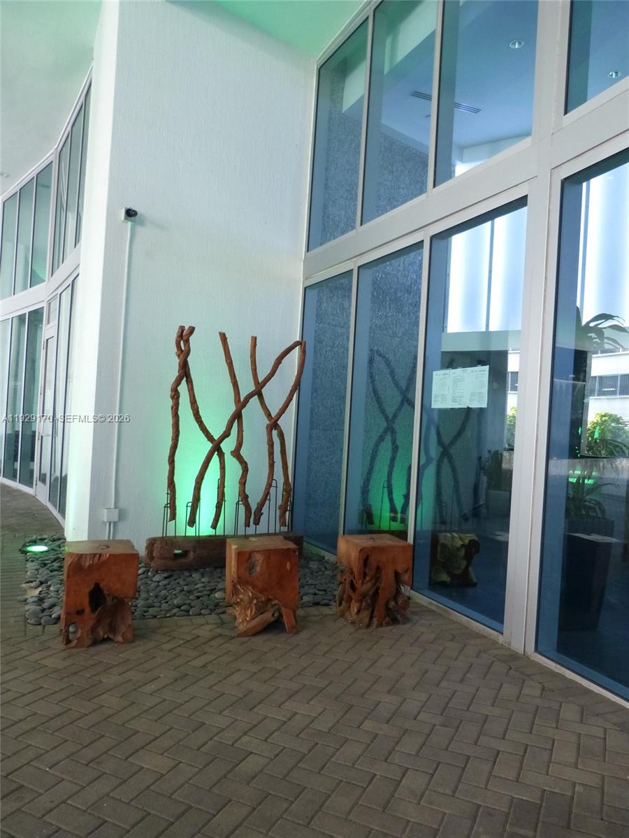 90 Southwest 3rd Street, Unit 1110 Miami, FL 33130 - Photo 45 of 55 a view of a bench in front of a building