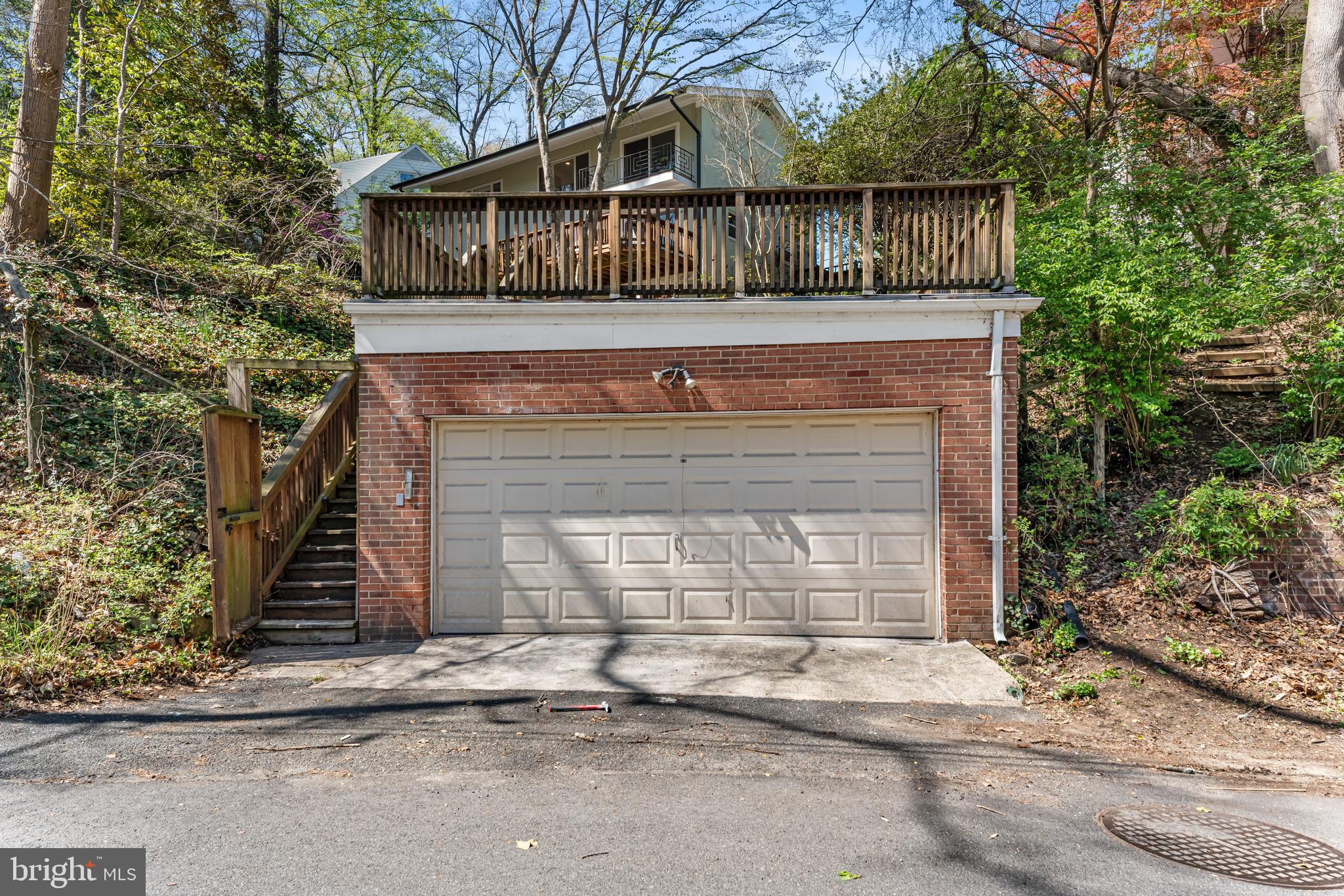 2820 Ellicott Street Northwest Washington, DC 20008 - Photo 43 of 43 a front view of a house with garage