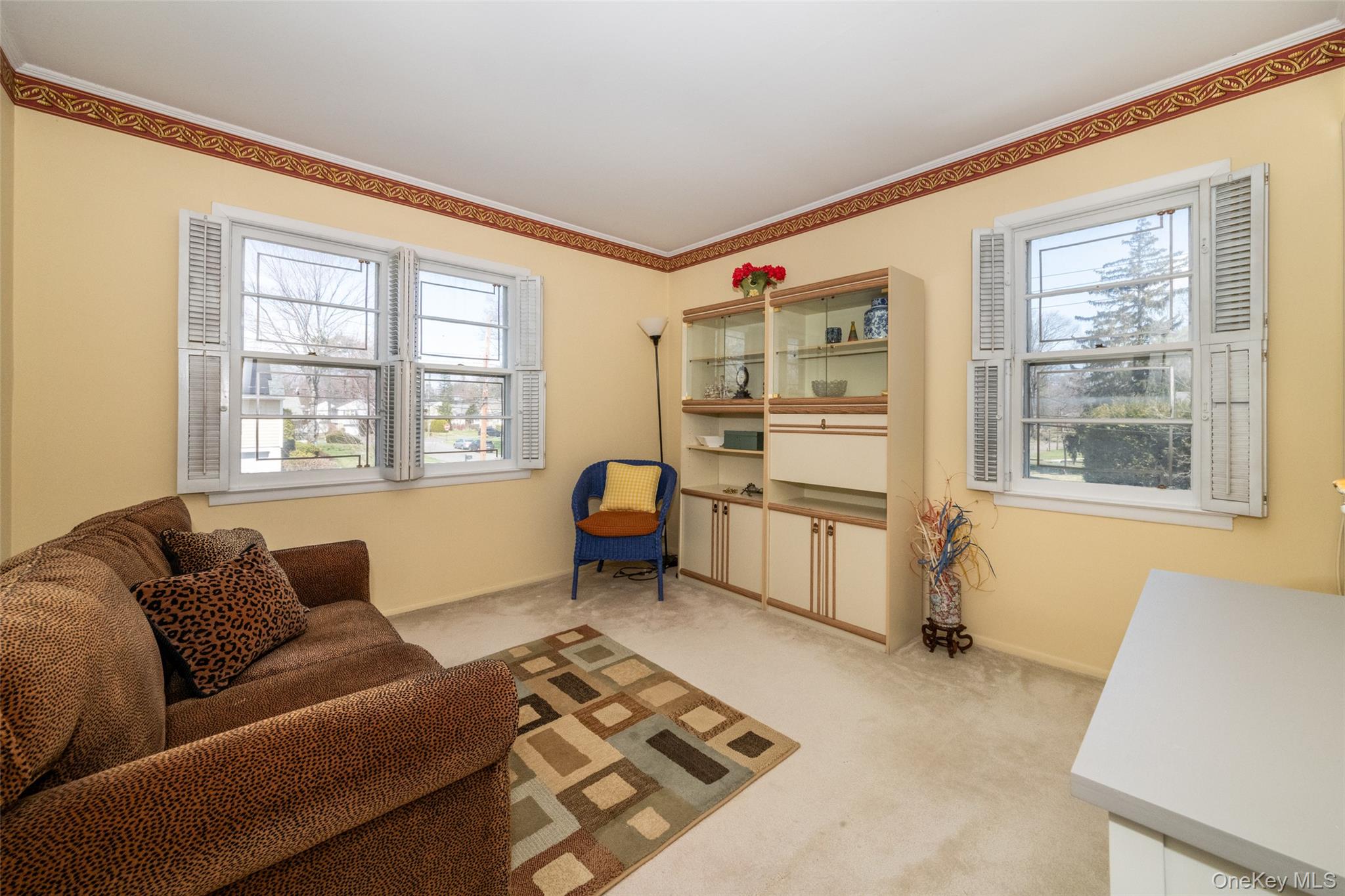 285 Stuart Drive New Rochelle, NY 10804 - Photo 16 of 37 a living room with furniture and windows