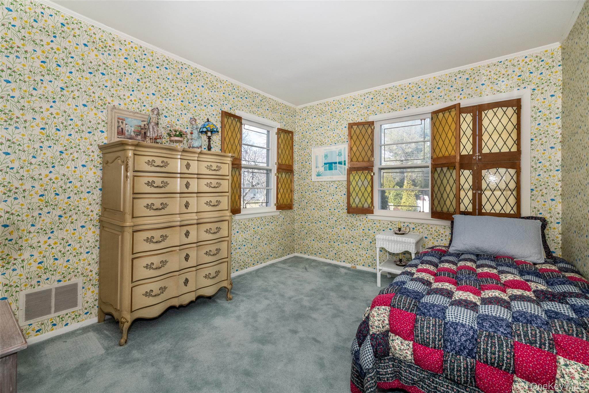 285 Stuart Drive New Rochelle, NY 10804 - Photo 19 of 37 a bedroom with a bed and a window