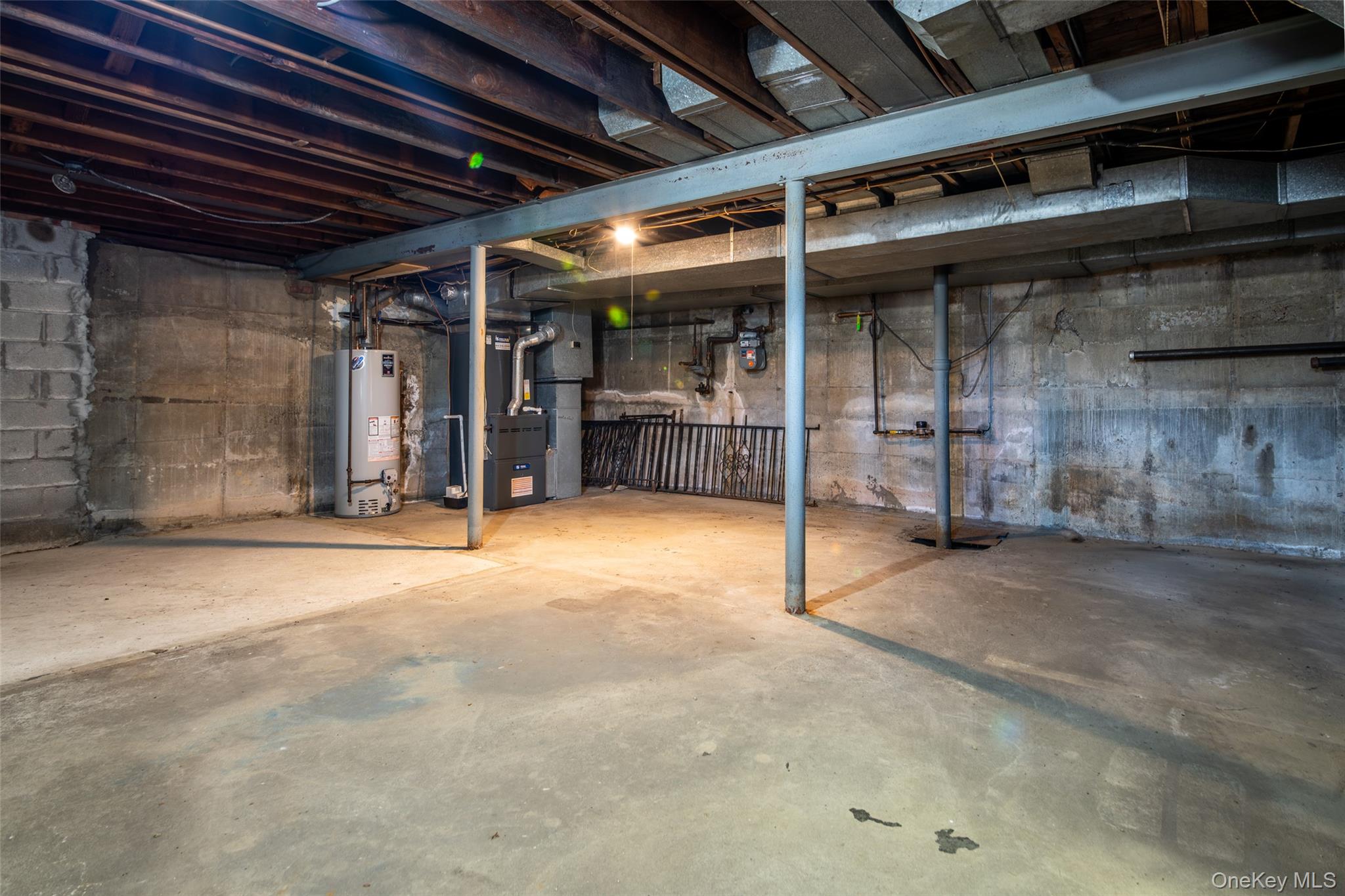 285 Stuart Drive New Rochelle, NY 10804 - Photo 29 of 37 a view of an empty room with wooden floor