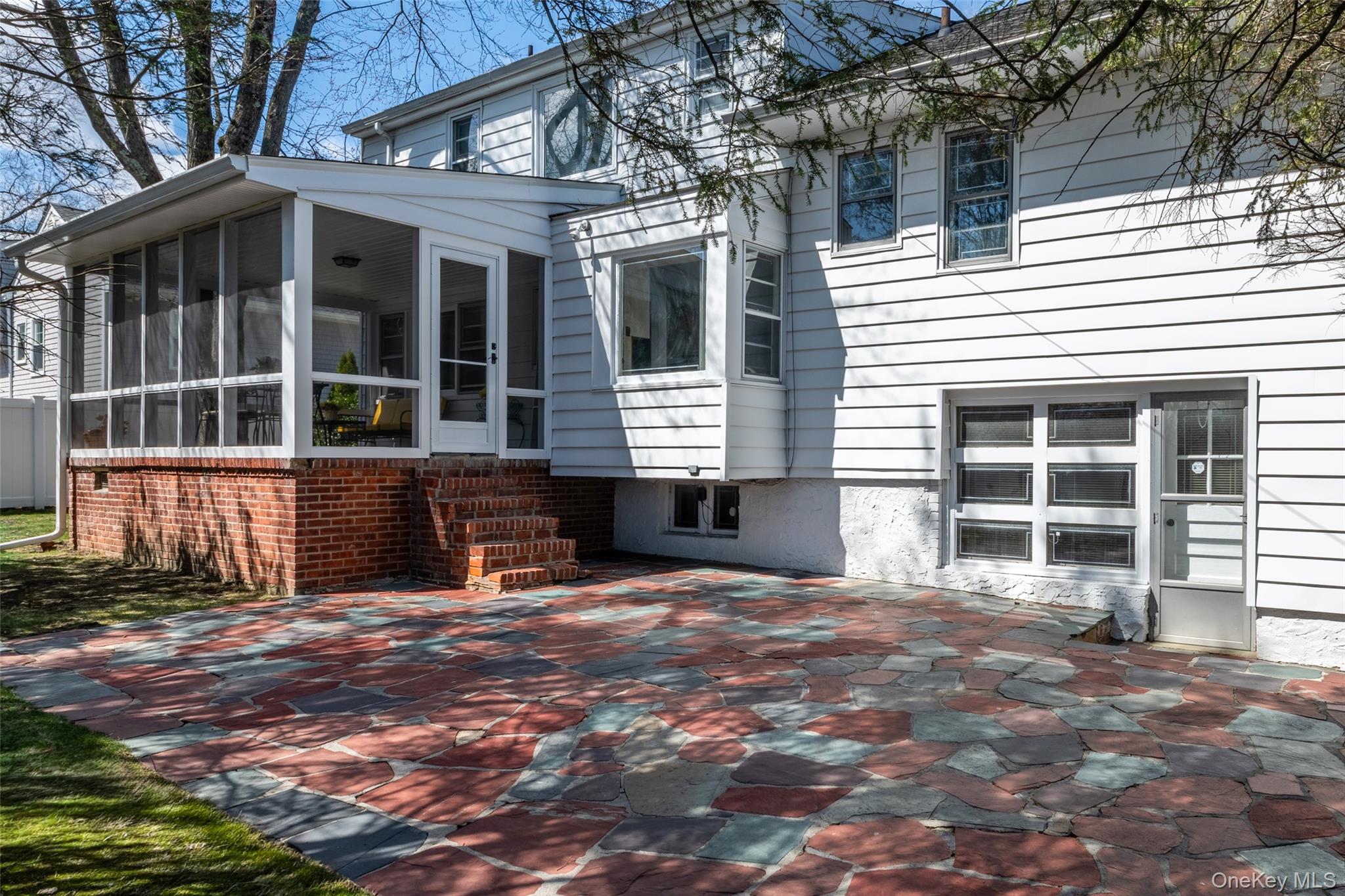 285 Stuart Drive New Rochelle, NY 10804 - Photo 31 of 37 a view of a house with a large window