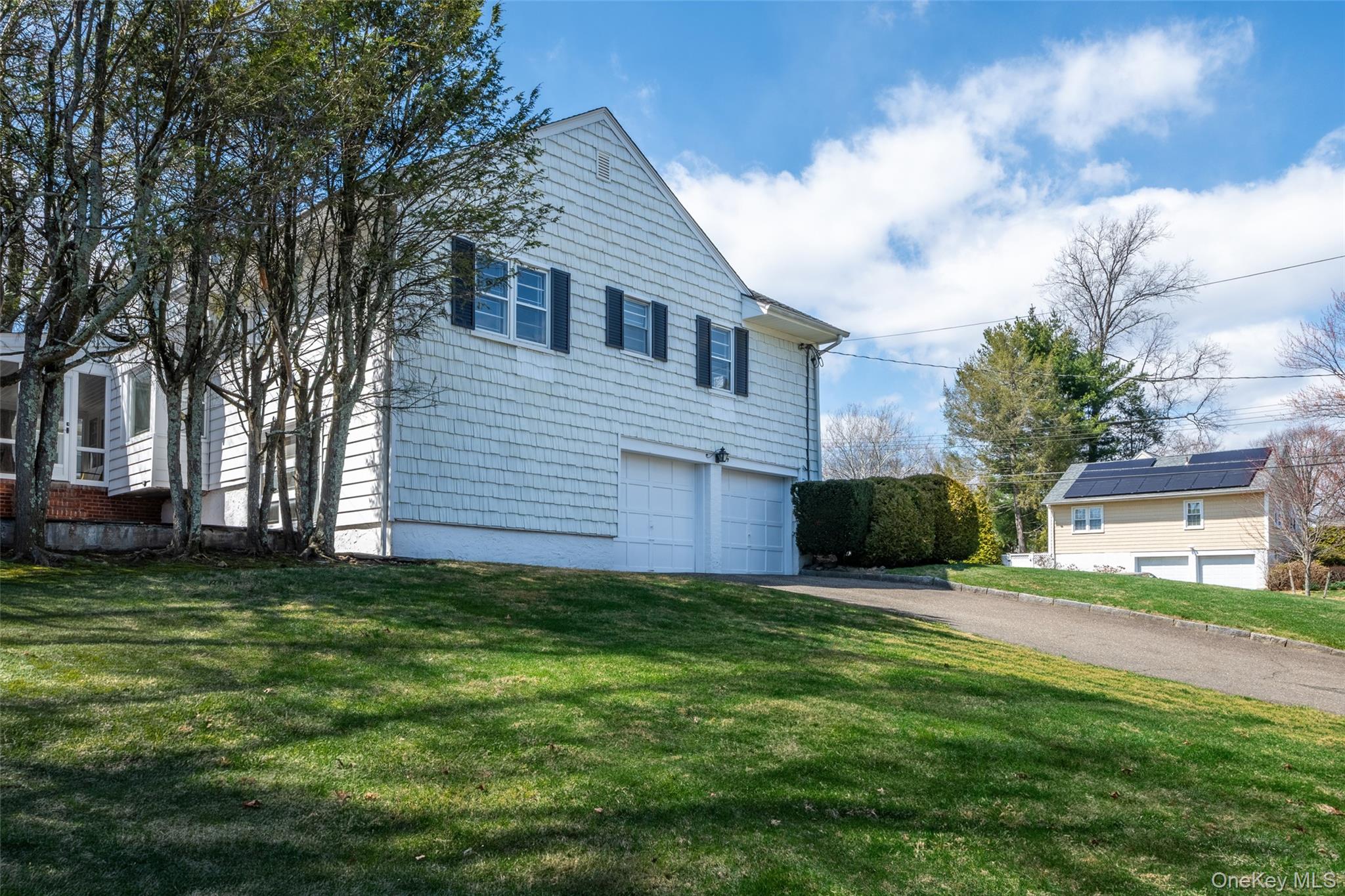 285 Stuart Drive New Rochelle, NY 10804 - Photo 32 of 37 a view of a house with a yard