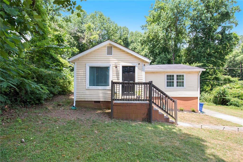 4285 Yates Road College Park, GA 30337 - Photo 1 of 1 a view of a house with a yard and fence