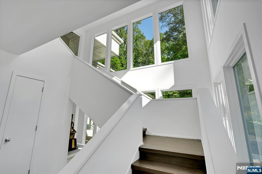 40 Jockey Hollow Road Bernardsville, NJ 07924 - Photo 16 of 49 a view of room with window and stairs