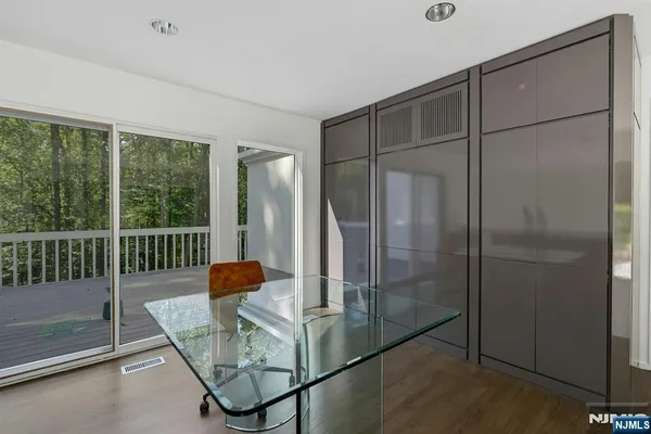 a room with sliding glass door