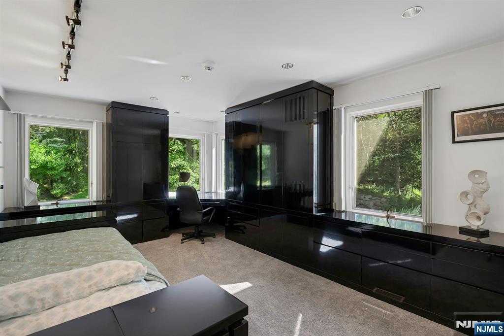 40 Jockey Hollow Road Bernardsville, NJ 07924 - Photo 35 of 49 a living room with furniture and a large window