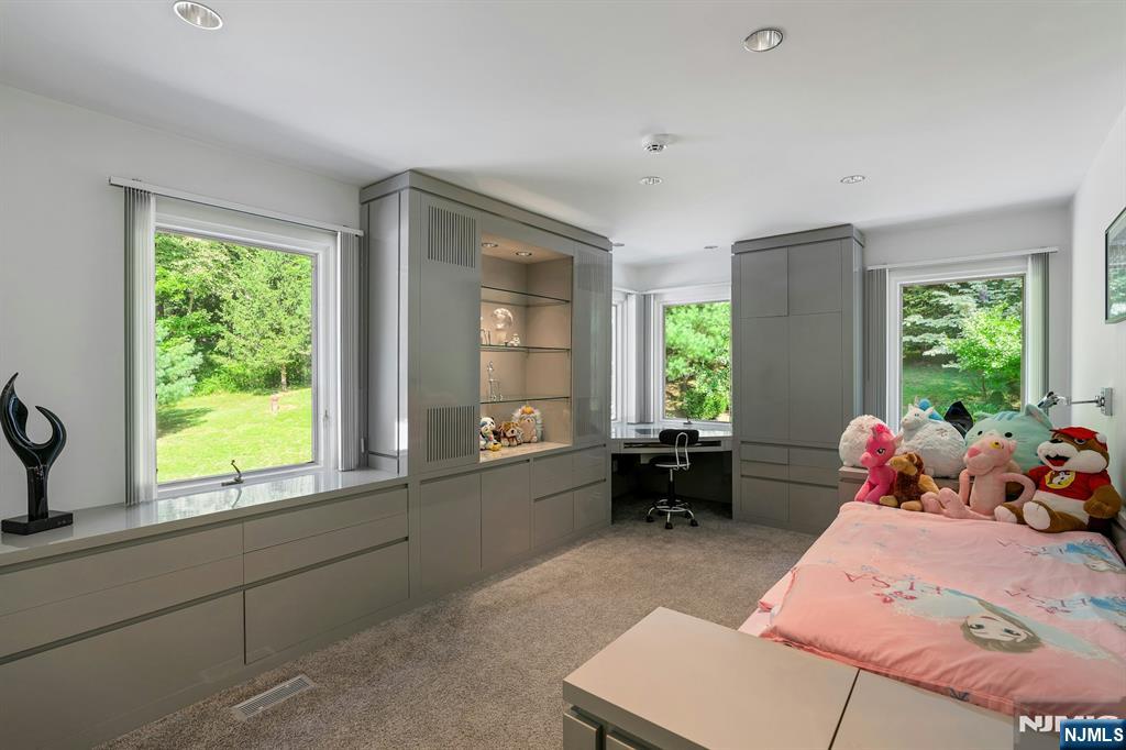 40 Jockey Hollow Road Bernardsville, NJ 07924 - Photo 36 of 49 a living room filled with furniture and a window