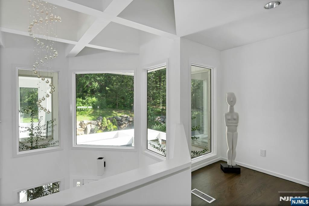 40 Jockey Hollow Road Bernardsville, NJ 07924 - Photo 39 of 49 a view of an entryway with wooden floor and windows