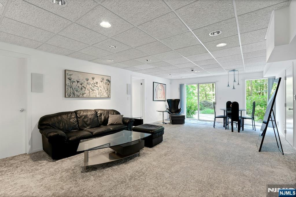 40 Jockey Hollow Road Bernardsville, NJ 07924 - Photo 43 of 49 a living room with furniture rug and a table
