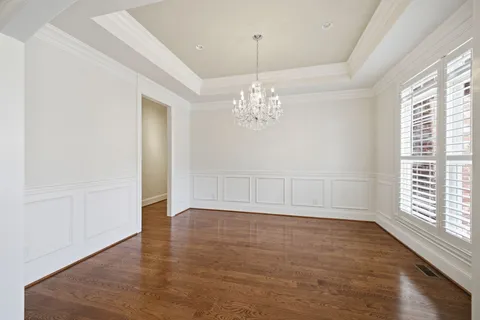 a view of gallery with wooden floor