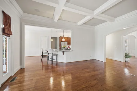 a kitchen with refrigerator cabinets and stove