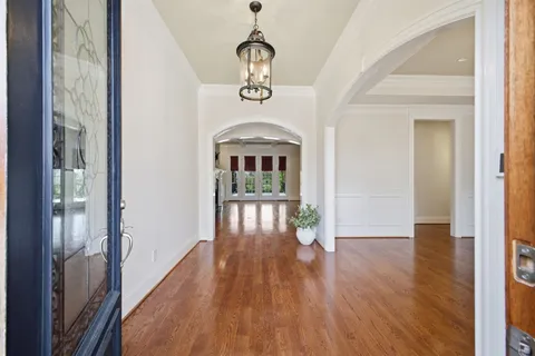 a view of a livingroom with a fireplace and window
