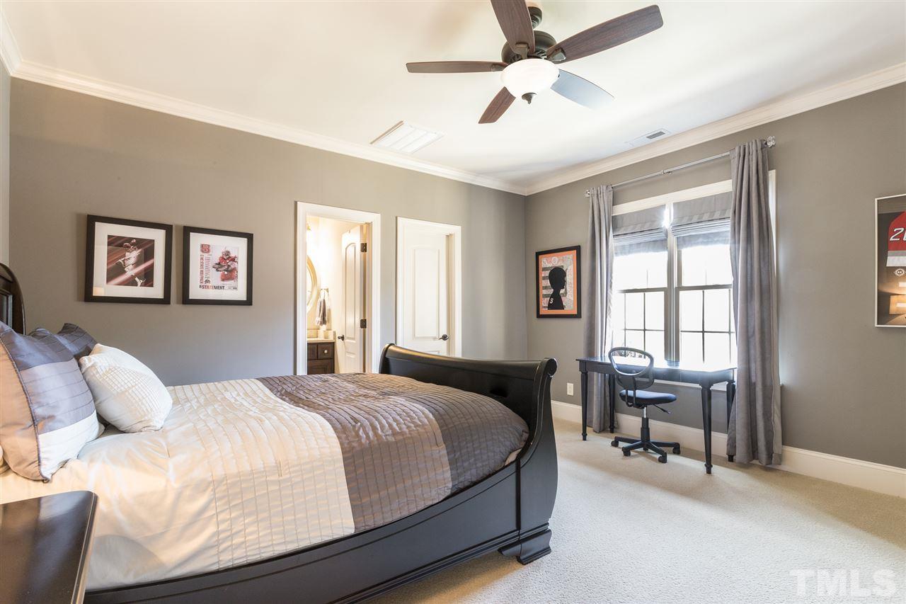 6020 Valencia Court Raleigh, NC 27614 - Photo 16 of 29 a bedroom with a bed and a window