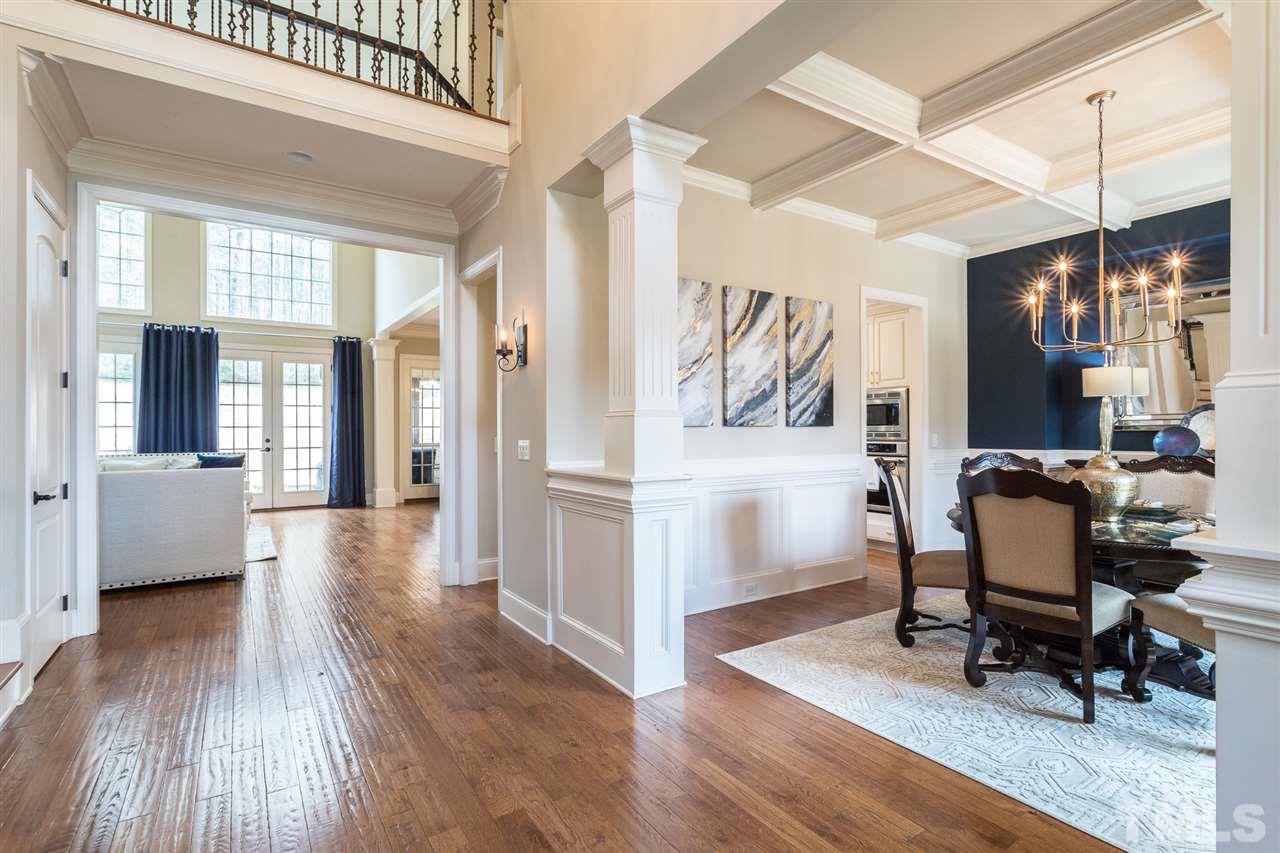 6020 Valencia Court Raleigh, NC 27614 - Photo 3 of 29 a view of a livingroom with furniture and a workspace