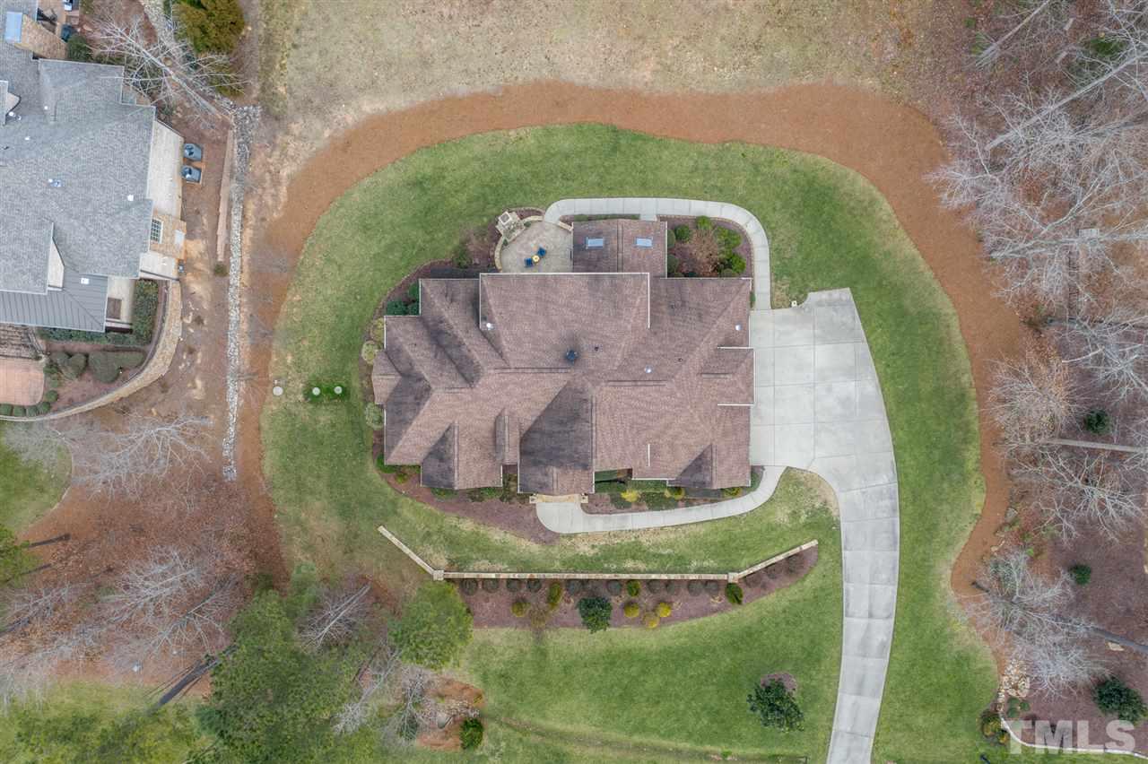 6020 Valencia Court Raleigh, NC 27614 - Photo 29 of 29 a view of a swimming pool with a yard