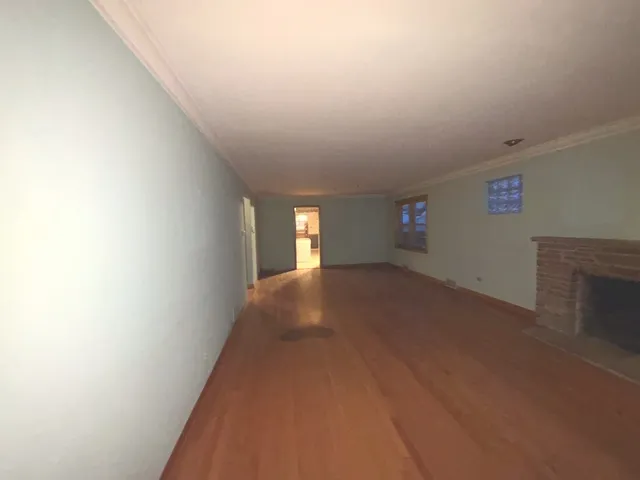 a kitchen with a sink a stove and cabinets