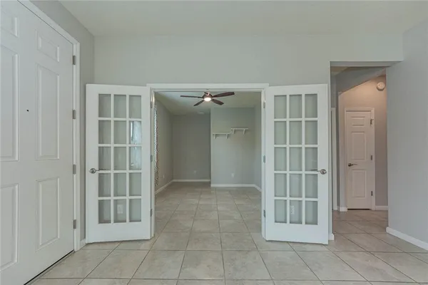 an empty room with windows